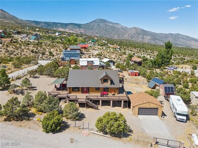 This log home offers breathtaking mtn views.