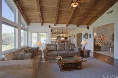 Family room looking into kitchen area