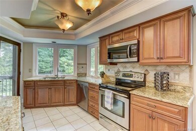 Kitchen from another angle with sink overlooking g