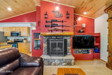 GREAT ROOM WITH STONE FIREPLACE