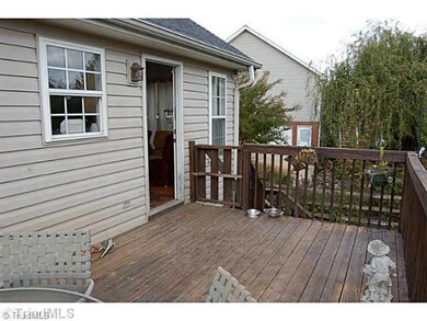 Exterior Back. Great deck overlooking backyard