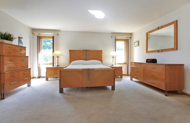 Large master bedroom  suuite with a huge walk in c