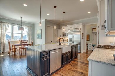 The Kitchen also has 2 pantries for extra storage and a separate wine fridge with a large island with farm sink for the cook in the house!!