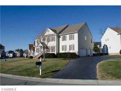 Exterior Front - The extended width driveway leads