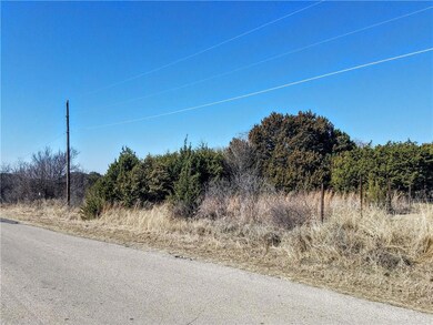 Heavily treed lot with endless possibilities...