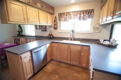 The Kitchen has stainless steel appliances, plenty