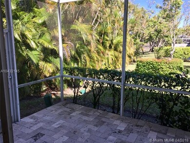 Side patio overlooking the garden and canal