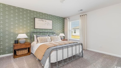 Bedroom featuring carpet flooring
