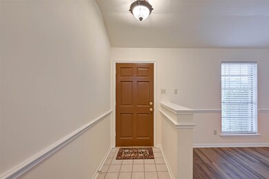 Front door opens to the formal living and dinning