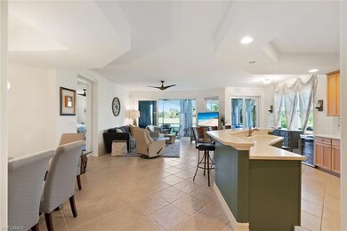 Kitchen with recessed lighting, a center island wi