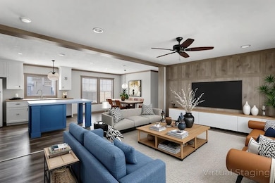 Spacious open floor plan living room, great and nice natural light. This is virtually staged.