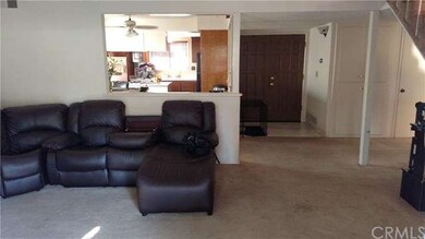 View of large living room from patio door looking 