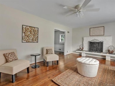 Living Room with Hardwoods, Wood Burning FP
