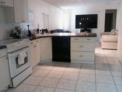 kitchen looking out to open living room