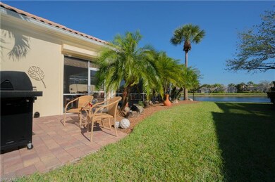 Pavered and lushly landscaped Grilling Area overlo
