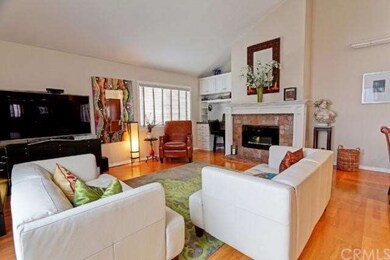 Gorgeous fireplace with decorative tile next to a 