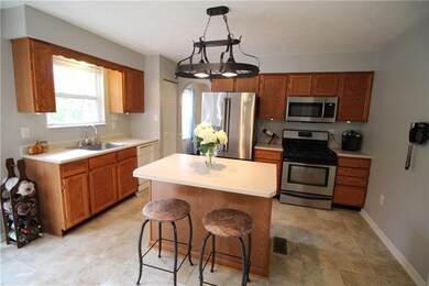 The spacious kitchen includes a center island and 