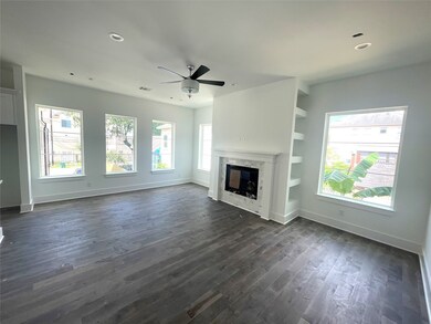 Living Room with Wall of Windows * Fireplace * Boo