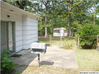OPEN PATIO W/ A GAS GRILL FOR ALL YOUR COOK-OUTS A