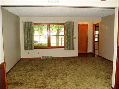 Living room overlooks the covered front porch.