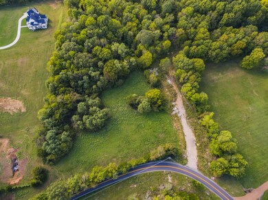 The lot includes over 5 acres of land, giving you lots of development options! It’s a blank canvas waiting for you to add your dream home.