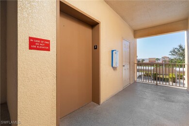 Corridor featuring elevator