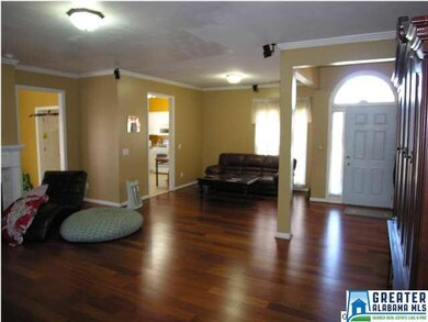 View of dining room with new hardwood floors.