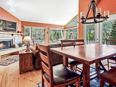 Dining area with a chandelier, wood finished floor