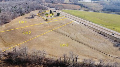 Birds eye view of property with a rural view
