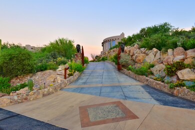 Long Gated Driveway to Entrance