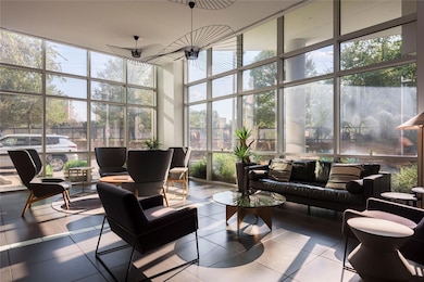 Sunroom / solarium featuring floor to ceiling win