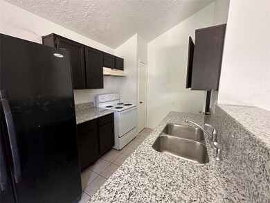 11024 Panicum Ct, Houston, TX 77086 - photo 4