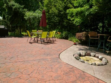 PRIVATE, STAMPED PATIO WITH FIRE PIT
