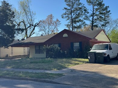 View of front of property featuring brick siding a