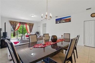 Dining area featuring a notable chandelier