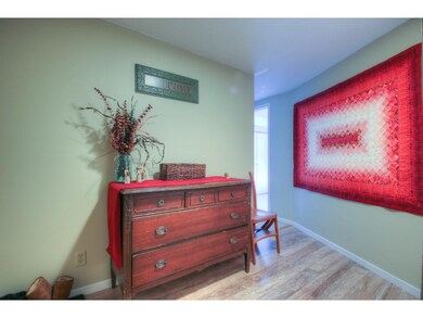 Welcoming foyer with modern paint colors and floor