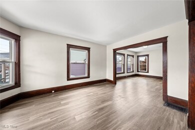 Empty room featuring wood-type flooring