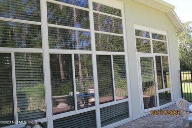 Back View Of Glassed Sunroom