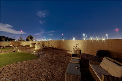 View of patio featuring a fenced backyard and an o