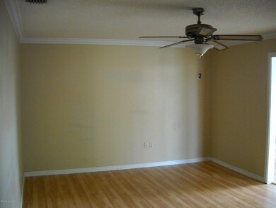 Living room view with laminate flooring