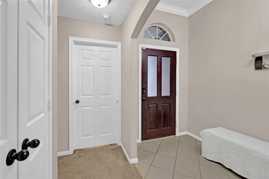 This split floorplan has a welcoming entryway featuring crown moulding and a large coat closet.