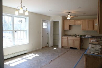 Bright and sunny eat in kitchen and dining room