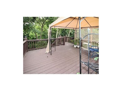 Gazebo cove on the deck with views of the backyard