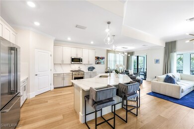 Kitchen with sink, high end appliances, white cabi
