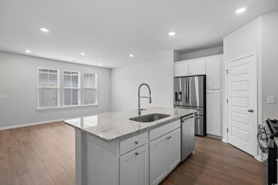 Kitchen featuring a sink, stainless steel applianc