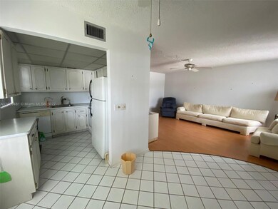 View of kitchen and living room