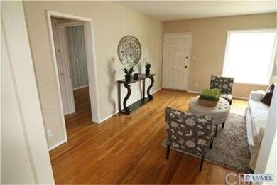 Formal Living Room and Entry with Hardwood Floorin