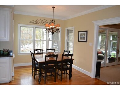 Spacious eat-in area overlooking private back yard