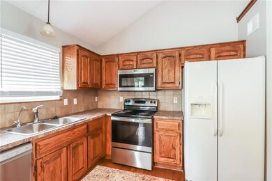 1113 Manse Dr, Raymore, MO 64083 - photo 6