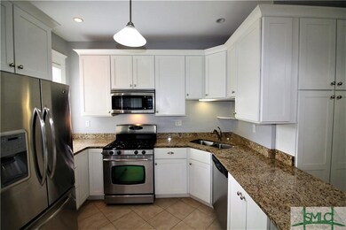 Kitchen w/ Granite Counters and Stainless Steel Ap